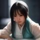 黄本子指南资深编辑王雅琳的专业形象照，年轻女性在明亮办公室内工作